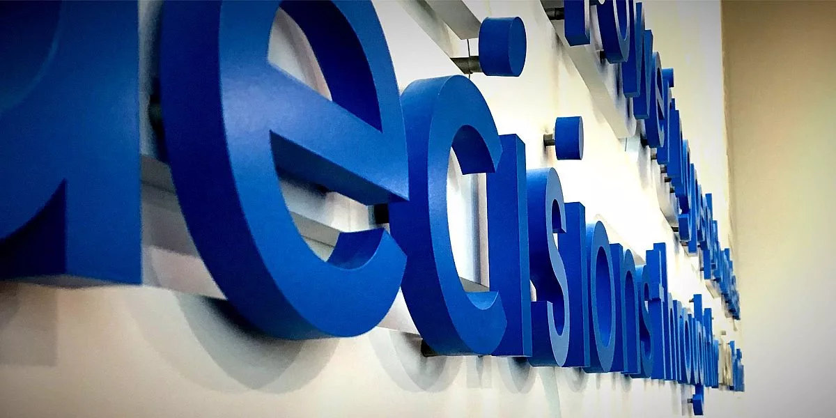 interior-3d-dimensional-logo-wall-sign-blue-letters.jpg
